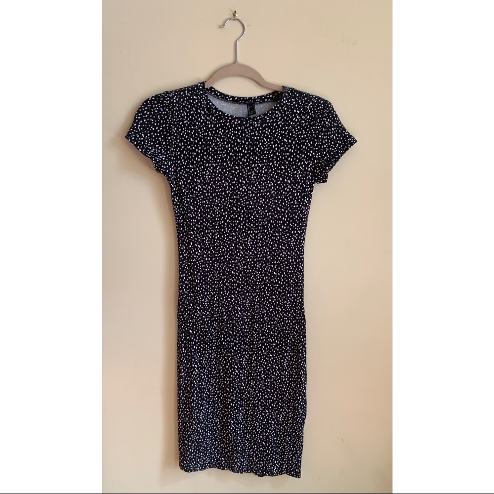 Black and white polka dot body con dress